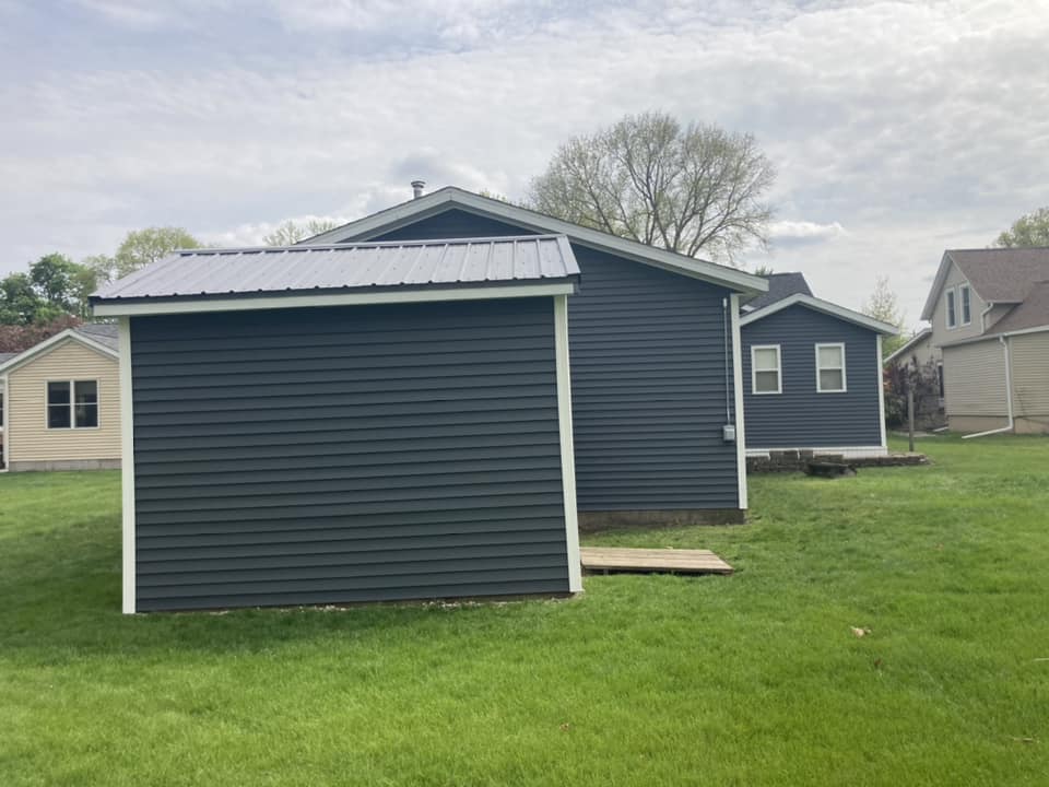 Back by the shed - Vinyl siding installed on a home in Durant, Iowa