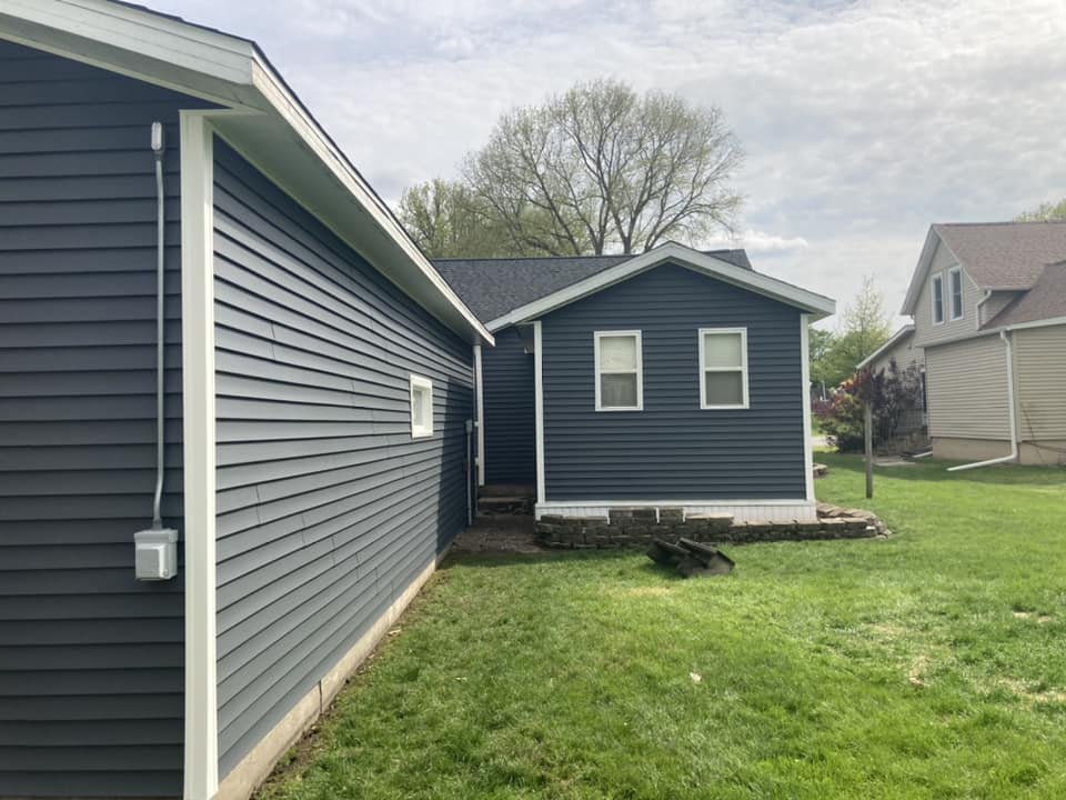 Back of a home in Durant, Iowa, with new vinyl siding installed