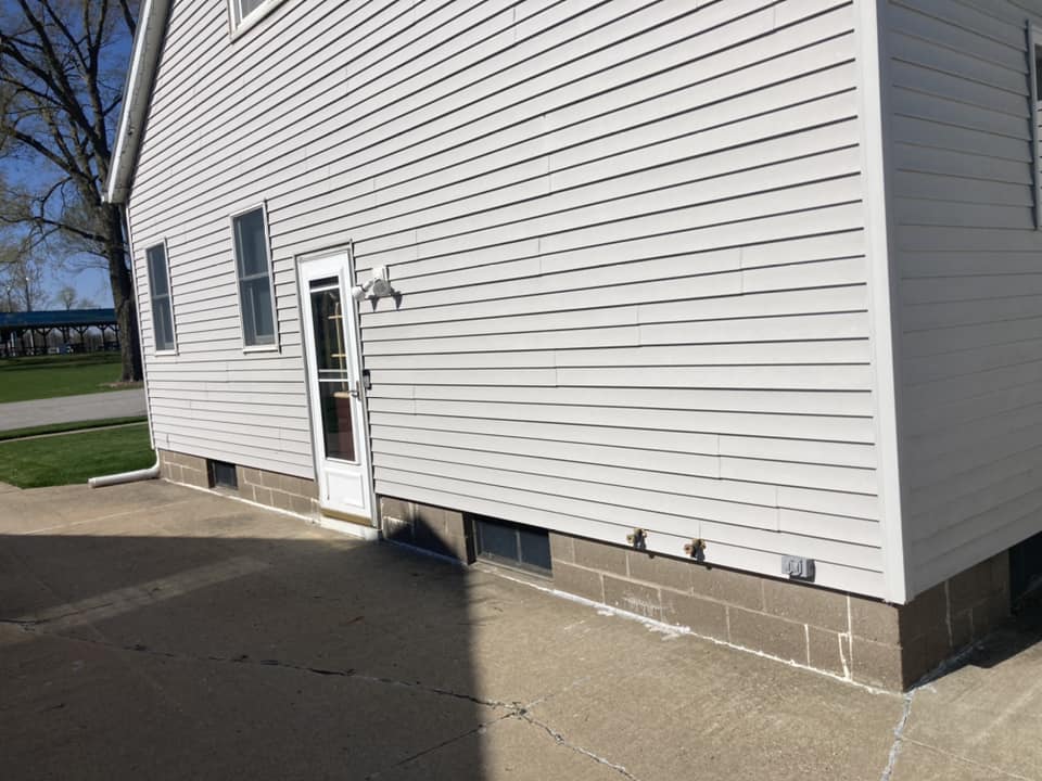 Driveway - Original siding on a home in Durant, Iowa