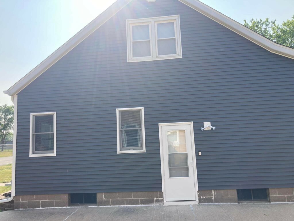 Finished vinyl siding installation in Durant, Iowa - Side of the home