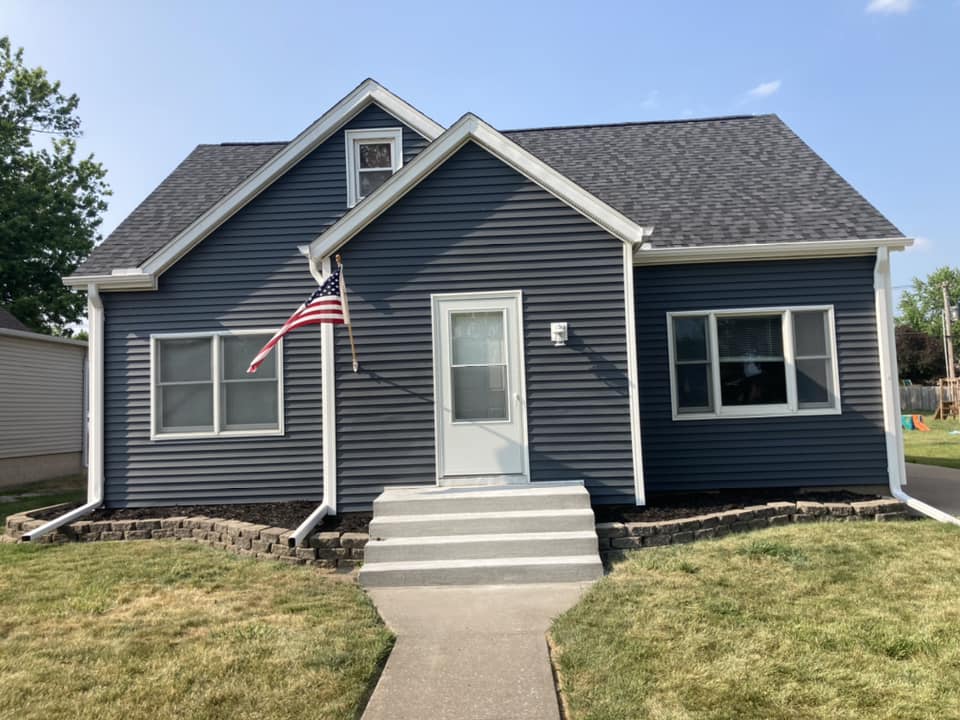 Front of the home with new vinyl siding installed in Durant, Iowa