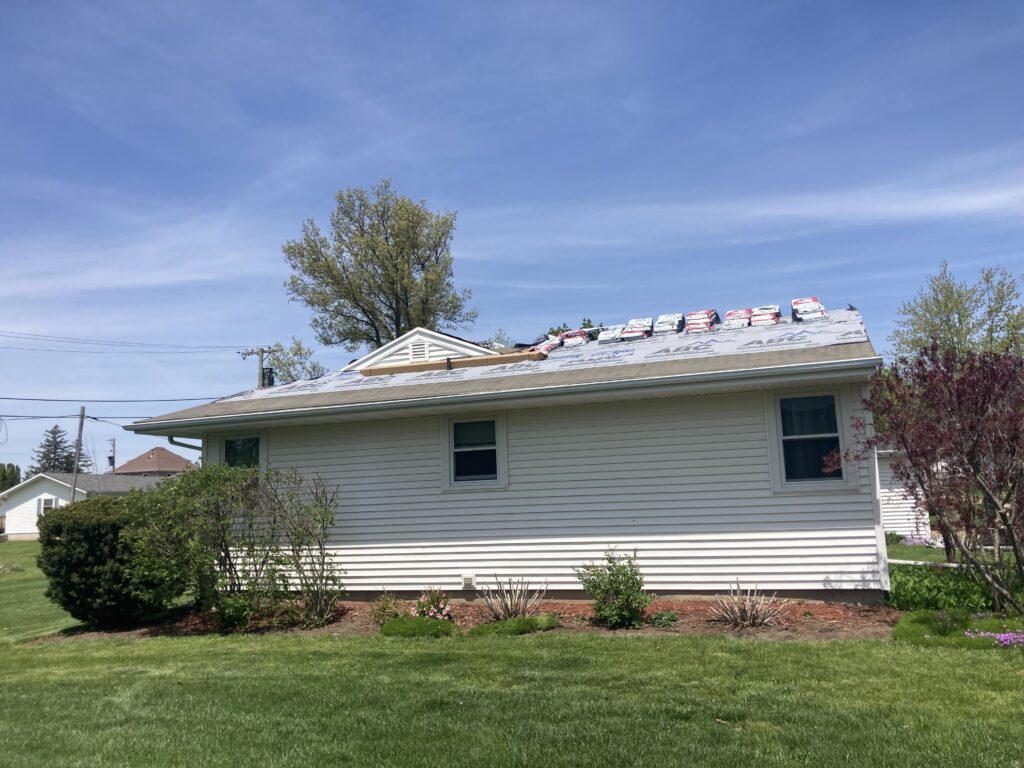 Roof with ice and water shield and synthetic underlayment ready for shingles on a home in Stanwood, Iowa.