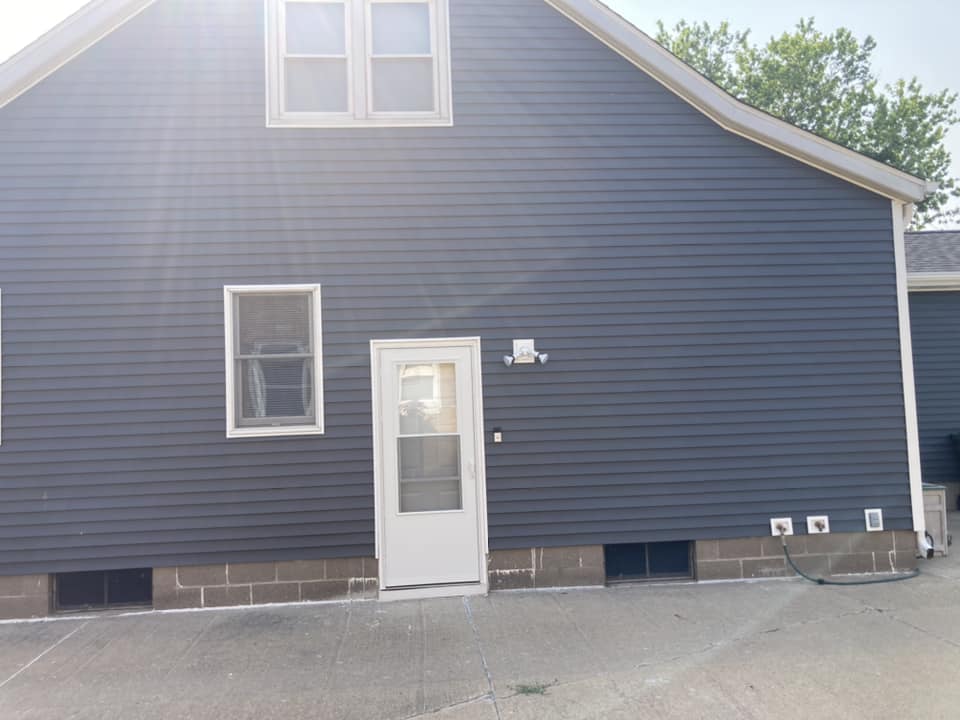 Side of the home with new vinyl siding on a home in Durant, Iowa