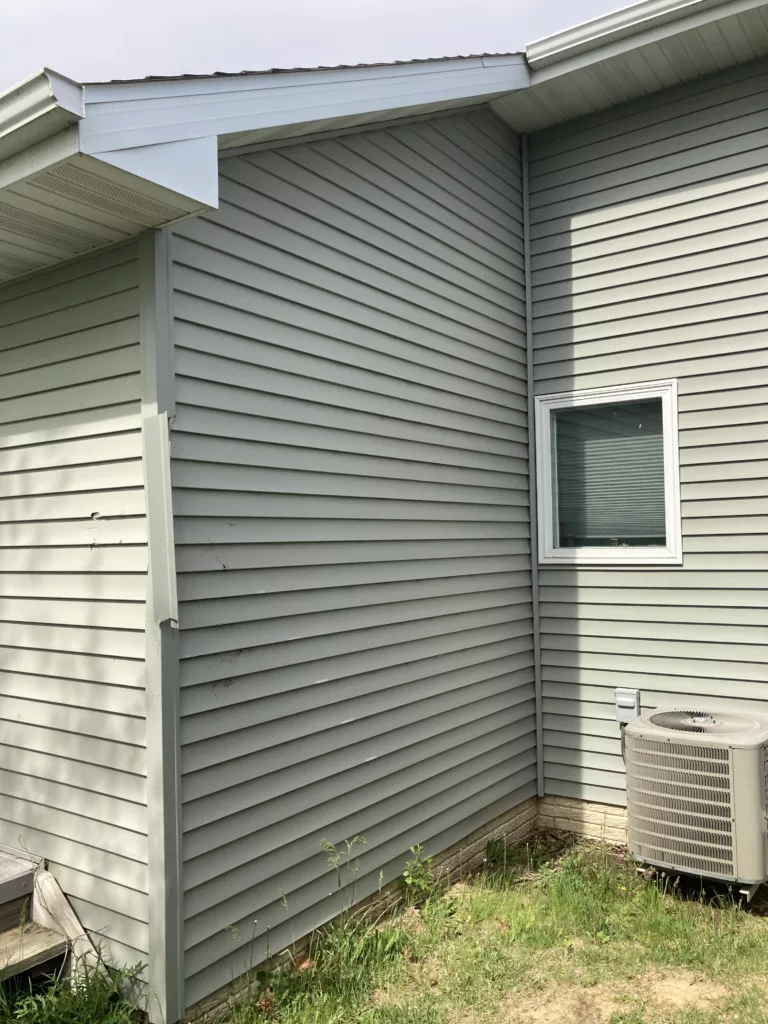 Storm-Damaged Siding, Shingles, Gutters, and Downspouts in Tipton, Iowa