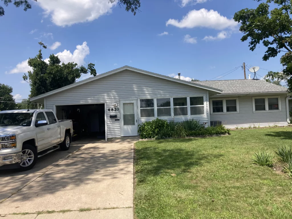 Before - Front of home with a satellite dish Ridge located in Cedar Rapids, Iowa