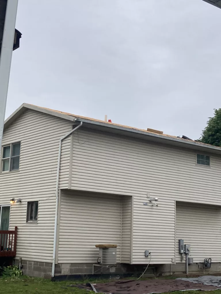 Removed age-related damaged roof in Davenport, Iowa