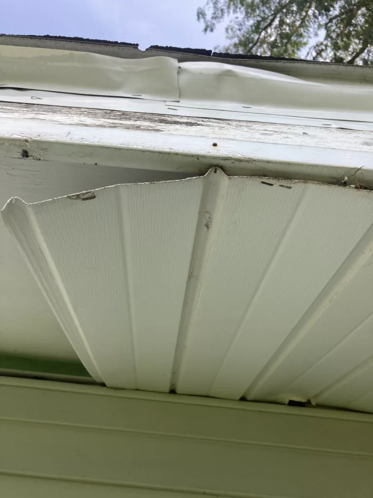The owner's temporary soffit repair to try and stop wildlife from entering the roof in Cedar Rapids, Iowa