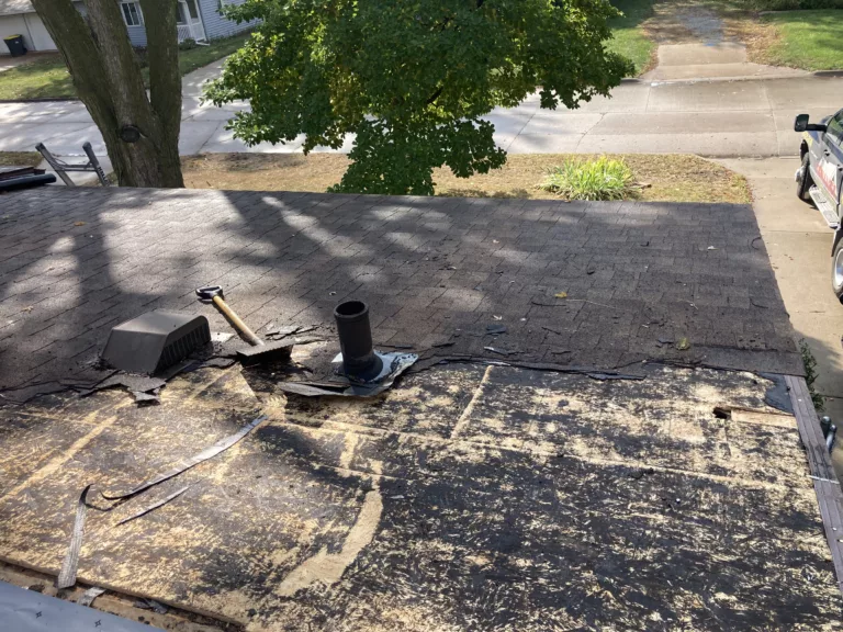 Shingle roof tear off on a home in Miller-Orchard in Iowa City, IA