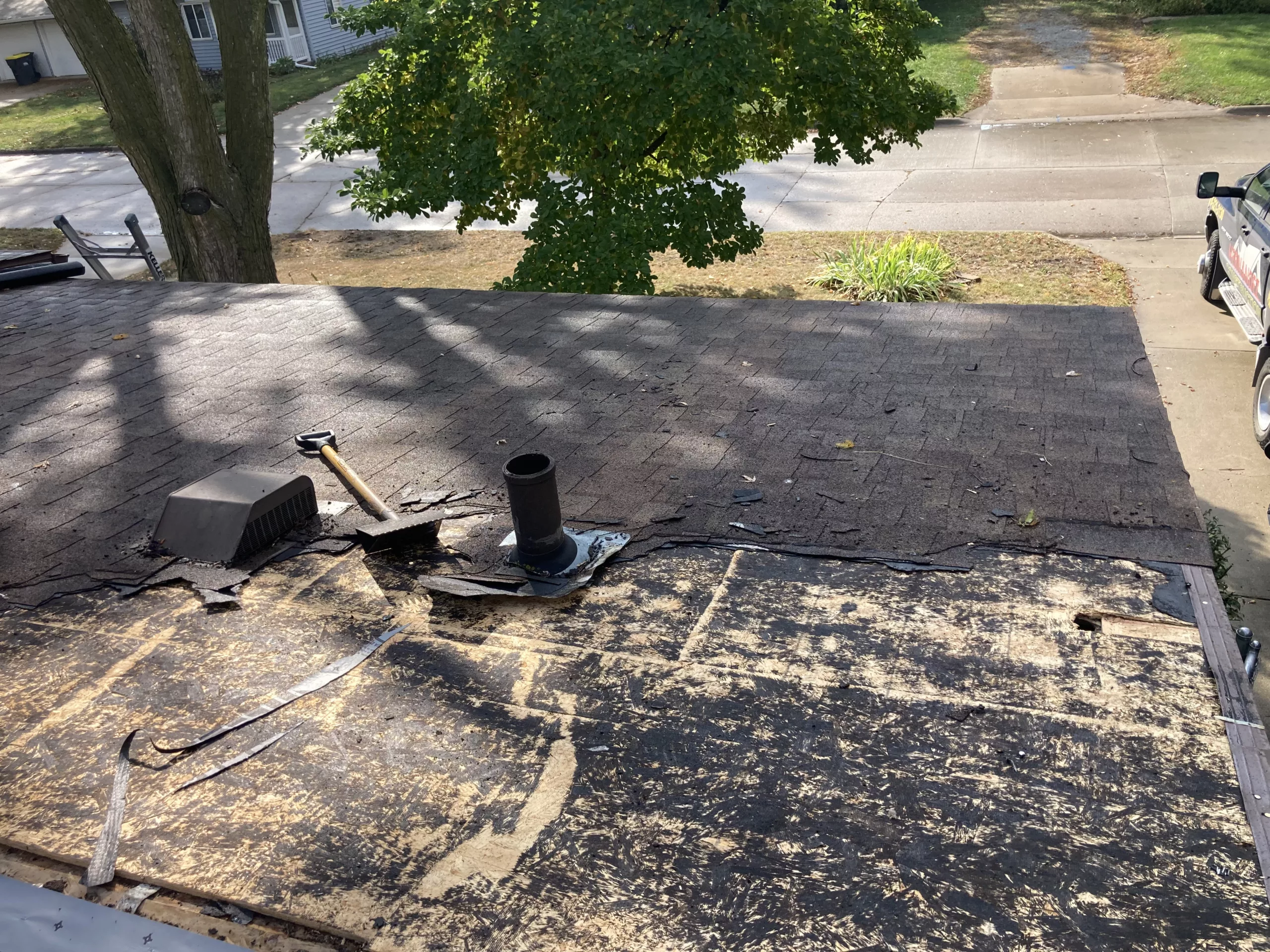 Shingle roof tear off on a home in Miller-Orchard in Iowa City, IA
