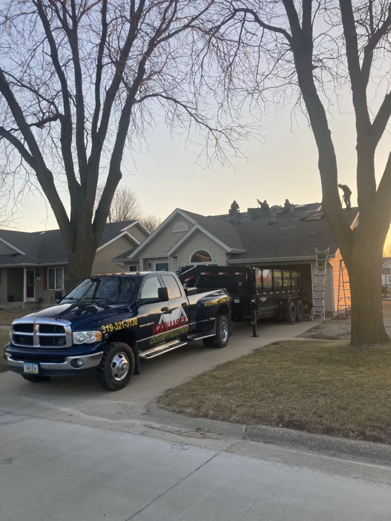 Crew finishing the new roof in Tipton, Iowa
