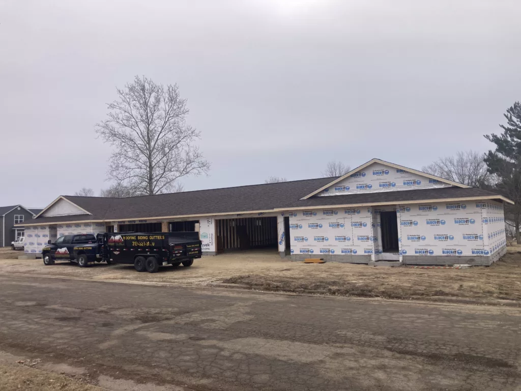 Finished new roof on a newly constructed duplex in Tipton, Iowa